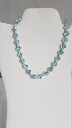 "This 1940's-50's BLUE IRIDESCENT CRYSTAL NECKLACE is 14\"-16\" long. The delicate BLUE shade of the crystal beads is rare and would be perfect to wear in a wedding. ( see photos for sizes & details ) This necklace is in VERY GOOD-EXCELLENT VINTAGE CONDITION. Questions ? Please call 1-207-865-6191." Blue Single Strand Beaded Necklace For Wedding, Blue Single Strand Wedding Necklace, Blue Crystal Necklaces With Faceted Beads, Blue Crystal Necklace With Faceted Beads, Blue Crystal Necklaces For Wedding, Blue Crystal Necklace For Wedding, Vintage Blue Crystal Necklaces, Blue Vintage Crystal Necklaces, Vintage Bridal Necklace