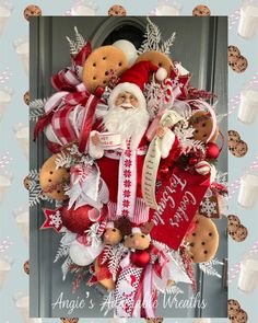 a christmas wreath with teddy bears and santa clause on it, hanging from the front door