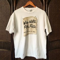 Will Work For Food Vintage TShirt   Chest 22 Length 28 Size L Good Condition ❌ Please see pictures❌ Vintage White T-shirt With Letter Print, Vintage Graphic Crew Neck T-shirt, Vintage Crew Neck T-shirt With Graphic Design, Vintage Crew Neck Shirt With Graphic Print, Vintage Text Print Crew Neck Shirt, Vintage Short Sleeve Shirt With Graphic Print, Vintage White T-shirt With Text Print, Vintage Relaxed Fit Short Sleeve T-shirt, Vintage Print Relaxed Fit Short Sleeve T-shirt