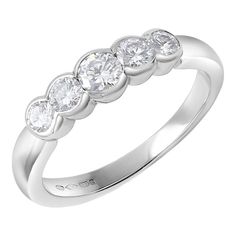 This is part of Chairish’s Fine Jewelry assortment.  Introducing our exquisite Platinum Vintage Five Stone Diamond Ring, a timeless piece that exudes elegance and sophistication. This stunning ring features a graduated arrangement of brilliant cut diamonds totaling 0.30 carats, delicately set in a scalloped edge design. Crafted with care and precision, this ring showcases the finest quality diamonds, each meticulously selected for their brilliance and clarity. Constructed from luxurious platinum Anniversary Brilliant Cut Lab Grown Diamond Ring, Classic Diamond White Diamond Ring With Tension Setting, Classic White Gold Diamond Ring With Tension Setting, Classic Diamond Ring With Single Cut Round Stone, Classic Platinum Half Eternity Ring, Anniversary Platinum Diamond Ring With Tension Setting, Formal Diamond White Half Eternity Diamond Ring, Classic Platinum Half Eternity Diamond Ring, Timeless Lab Grown Diamond Ring For Anniversary