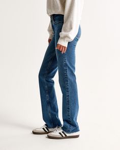 Our classic 90's-style jeans in a dark wash with a raw hem. This fit features a 9.5” mid rise, is fitted at the waist and hips, and eases at the thigh into a straight, full-length leg shape. This jean is made from our vintage stretch fabric which features both an authentic vintage look and contains slight built-in stretch for additional comfort. Fitted Cutoff Flare Denim Jeans, Fitted Dark Wash Cutoff Jeans, Dark Wash Retro Relaxed Fit Flare Jeans, Retro Dark Wash Relaxed Fit Flare Jeans, Fitted Cutoff Everyday Jeans, Fitted Flare Jeans With Frayed Hem In Rigid Denim, Fitted Cutoff Jeans For Streetwear, Everyday Fitted Flare Jeans In Rigid Denim, Fitted Flare Jeans With Frayed Hem For Everyday