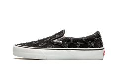 The Supreme x Vans Slip-On Pro “Black Hole Punch Denim” is one of two deconstructed colorways of the casual skate focused silhouette that were released during Supreme’s Spring/Summer 2020 collection. Supreme and Vans continued their partnership with a “Hole Punch Denim” collaboration that finds Vans’ classic Slip-On Pro and Sk8-Hi Pro in “do-it-yourself” designs. Here, frayed holes appear on the forefoot, mid-panel, and heel of the black denim upper. A classic Vans hang tab dots the forefoot. Su Vans Slip On Pro, Denim Vans, Classic Vans, Vans Slip On, Pro Black, Denim Shoes, Sk8 Hi, The Supreme, Mens Vans