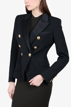 Balmain Black Wool Double Breasted Gold Buttons Blazer Jacket. Front button-up closure. Lined. Front pockets. Padded shoulders. Tonal stitching. Size: 38 (Small)Condition: This item is in very good pre-loved condition with no visible flaws. Luxury Career Outerwear With Buttons, Tailored Black Blazer With Gold Buttons, Luxury Black Blazer With Gold Buttons, Tailored Black Outerwear With Gold Buttons, Fall Outerwear With Gold Buttons And Suit Collar, Fitted Black Outerwear With Gold Buttons, Black Blazer With Gold Buttons For Work, Black Formal Outerwear With Gold Buttons, Elegant Black Outerwear With Gold Buttons