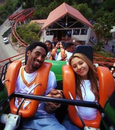 a man and woman sitting in an amusement park ride with the caption how i'm trying to be this summer