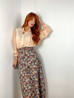 "Vintage hand made 70s maxi skirt in an A-line shape with floral print in many neutral shades of orange, yellow, blue, gray, brown, etc.  Shown here on a size FR 36 / UK 8 / US 2 / S model 172 cm / 5'8\" height. It fits loosely. This skirt would best fit a FR 36-38/ UK 8-10 / S-M depending on your desired fit, but please verify all measurements to be sure. Waist: 36.5cm - 14.25in Hips: 52cm - 20.5in Overall Length:  Condition: Very good Material: no tag, but feels like cotton (not lined) Closure Vintage Brown Flowy Skirt, Retro Beige Skirt For Spring, Vintage Flared Skirt For Spring, Fall Vintage Maxi Skirt, Spring Vintage Skirt For Vintage Fashion, Vintage Fashion Skirt For Spring, Spring Vintage Fashion Skirt, Vintage Beige Flowy Skirt Bottoms, Retro Spring Flowy Maxi Skirt