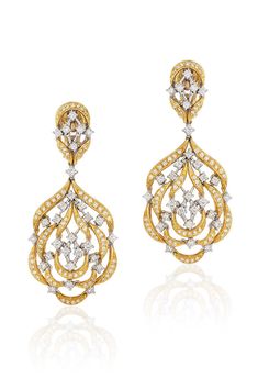 18 karat gold and diamond drop earrings by fine jewelry house Andreoli. 18 karat Gold, 25.3 grams 3.02 carat Diamond Expertly crafted in Italy Andreoli is known for creating bold heirloom steeped in Italian cultural heritage. Their collection of statement wearable art pieces can be worn during celebrations and to elevate your everyday. Estimated Delivery7 working days Customs Duties & Taxes may apply. Shipped from USA Gold And Diamond Earrings, Diamond Chandelier Earrings, Cocktail Earrings, Quince Ideas, Jeweled Earrings, Diamond Dangle Earrings, Precious Jewels, Diamond Drop Earrings, Diamond Drops