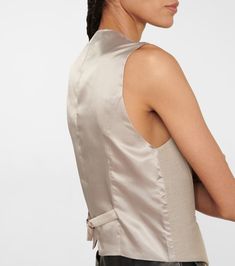 Elegant Sleeveless Beige Vest, Elegant Beige Sleeveless Vest, Fitted Vest With Hidden Button Closure For Office, Fitted Office Vest With Hidden Button Closure, Fitted Office Vest With Hidden Buttons, Elegant Business Casual Suits With Vest, Elegant Sleeveless Business Vest, Elegant Sleeveless Vest For Business, Elegant Tailored Vest For Work