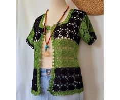 This stylish green/black vest is knitted with love with %100 Microfiber Acrylic distinctive silky effect high quality yarn. This cardigan is created by carefully combining small motifs. Will fit for S/M size. Width 33,5 inches (85cm), height 21,5 inches (54cm) Approx. Hand wash cold water only, lay flat to dry. Or Machine wash on gentle cycle only with cold water, lay flat to dry. *Due to the monitor's brightness and the light may be a little color difference. Thank you visit my shop. Fitted Green Cardigan For Summer, Fitted Green Cardigan For Layering, Black Casual Crochet Top For Layering, Black Bohemian Cardigan For Summer, Casual Black Crochet Top For Layering, Black Bohemian Summer Cardigan, Fitted Black Bohemian Cardigan, Green Bohemian Crochet Top, Black Crochet Top For Spring Layering