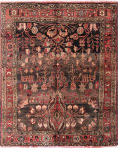 an antique rug with red and black colors