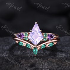 a ring with an amethorate, green and purple stones