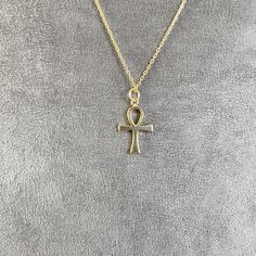 925 Sterlin Silver Ankh symbol represents the Eternal Life way back in Ancient Egypt also sometimes referred to as the Key of Life. Item Details ★ 10 - 14 - 18 K Real Gold ★ Necklace Diameter: 2.00cm x 1.20cm (0.79inc x 0.47inc) Welcome to our store, where you'll find designs perfect for both special occasions and everyday wear. Our collection is designed to help you stand out with unique, cool styles. Whether you're looking for something spiritual, religious, nature-inspired, nautical, or influ Egyptian Cross, Ankh Symbol, Ankh Pendant, Key Of Life, Real Gold Necklace, Ankh Necklace, Jewelry Cross, Yellow Soft, Pure Form