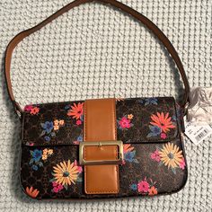 Pretty Nwt Brown Floral Shoulder Bag Fiona Baguette Floral Logo Non Smoking Home Nanette Lepore Handbag, Bucket Handbags, Floral Handbags, Hobo Purse, Black Crossbody Purse, Grey Bag, Pewter Grey, Brown Shoulder Bag, Floral Logo