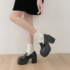 Elevate your style with our Black Chunky Platform High Heel Loafers. Featuring block heels and a chunky platform for enhanced stability and comfort, these loafers are crafted from sleek black patent leather, exuding a gothic, lolita, and alternative vibe. Designed for the sophisticated and tasteful woman, these exclusive loafers will complete any bold and stylish look. Block heels for stability and comfort Chunky platform for added height and edge Black patent leather for a sleek, glossy finish Perfect for gothic, lolita, and alternative aesthetics Ideal for the sophisticated, fashion-forward woman High Heel Loafers, Kawaii Socks, Heel Loafers, Sophisticated Fashion, Kawaii Jewelry, Platform High Heels, Chunky Platform, Short Socks, Heeled Loafers