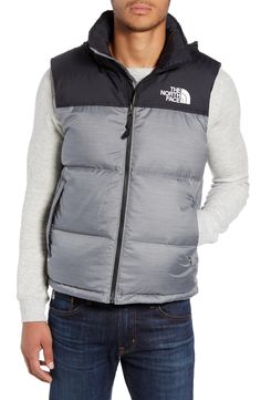 A retro North Face vest based on a baffle-quilted, down-insulated design from 1996 offers unmatched warmth right at the core. The durable ripstop shell with double-layer taffeta at the shoulders is perfect for backpacking, thanks to its packable design that can be stowed in its own pocket. Style Name:The North Face Nuptse 1996 Packable Quilted Down Vest. Style Number: 5698420. Outdoor Puffer Vest, Outdoor Puffer Vest With Down Filling, The North Face Down Puffer Jacket For Outdoor, Outdoor Down Puffer Vest, Outdoor Puffer Vest Made Of Down, Nylon Puffer Outerwear For Camping, Outdoor Quilted Down Vest, Casual Nylon Puffer Jacket For Camping, Nylon Puffer Vest For Outdoor