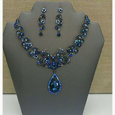 New Unused Cubic Zirconia And Australian Crystal Necklace Set. Matching Earrings Have Post Backings And Are Lightweight. This Necklace Is A Beautiful Breathtaking Piece To Enjoy For Years To Come. This Set Is Unique Because It's Rare To Find A Navy Blue Crystal And Cubic Zirconia Combination. Blue Cubic Zirconia Jewelry For Party, Blue Cubic Zirconia Party Jewelry, Blue Cubic Zirconia Teardrop Jewelry Sets, Blue Teardrop Cubic Zirconia Jewelry Sets, Blue Crystal Round Jewelry, Blue Crystal Jewelry Sets For Gifts, Elegant Blue Crystal Jewelry Sets, Sapphire Crystal Jewelry For Wedding, Royal Blue Crystal Jewelry For Party