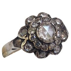 Antique early victorian era 1850s rose cut diamond ring in flower designe silver topped and gold Antique Rings Victorian 1stdibs, Rose Cut Diamond Ring, Victorian Ring, Rosecut Diamond Ring, Victorian Flowers, Succulent Wedding, Victorian Rings, Silver Tops, Rose Cut Diamond