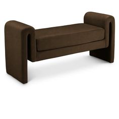 a brown couch sitting on top of a white floor