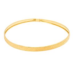 Immerse yourself in timeless elegance with our 14K Gold Over Sterling Silver Classic Bangle Bracelet. Each curve whispers of sophistication and grace, adding a touch of luxury to your ensemble. Crafted with precision, it delicately adorns your wrist, enhancing every gesture with understated beauty. Made with the finest 14K gold over sterling silver, this bracelet exudes enduring quality and timeless allure. Its classic design transcends trends, making it a versatile accessory for any occasion. Whether worn alone for a minimalist look or stacked with other bracelets for added flair, it elevates your style with effortless grace. At approximately 7 inches in width, this bangle bracelet strikes the perfect balance between delicacy and impact. Its sleek silhouette complements both casual and fo Elegant Gold Band Cuff Bracelet, Elegant Gold Band Bangle, Elegant Gold Band Jewelry, Elegant Gold Band Bracelet, Elegant Yellow Gold Band Jewelry, Elegant Adjustable Band Cuff Bracelet, Elegant Yellow Gold Band Bracelets, Adjustable Yellow Gold Elegant Bangle, Elegant Adjustable Yellow Gold Bangle