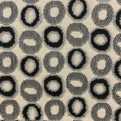 black and white fabric with circles on it