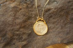 old coin necklace,24k gold pendant, old coin necklace,Ancient Greek Coin, ancient coin jewelry, unique gold pendant, 24k solid gold pendant done with 24k gold, this unique piece will make anyone that wears it happy. i know i like them very much. i am wearing one right now. the chain is made out of 14K gold , about 18 inches (45 cm) . coin is 18 mm diameter 14k gold . solid gold. 24k solid gold is a lifetime jewelry, with just the perfect look . can be worn daily and over night for those who neve Ancient Yellow Gold Coin Pendant Jewelry, Elegant Handmade Coin Necklace, Handmade Elegant Coin Necklace, Handmade Yellow Gold Coin Amulet Necklace, Handmade Yellow Gold Amulet Coin Necklace, Ancient Style Yellow Gold Necklace With Coin Pendant, Handmade Brass Coin Necklace With Round Pendant, Ancient Style Medallion Necklace In Yellow Gold, Ancient Yellow Gold Medallion Necklace