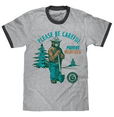 PRICES MAY VARY. YOUR NEW FAVORITE SMOKEY BEAR SHIRT: Enjoy the nostalgia of the iconic Smokey Bear mascot and "Please Be Careful Prevent Wildfires" phrase, lightly distressed and printed on the softest grey ringer t-shirt we could find. EASY CARE TEES: This Smokey Bear design is licensed and screen-printed on a soft, high-quality poly-cotton ringer tee shirt that goes from the washing machine to the dryer without losing shape, shrinking or fading. Graphic is intentionally distressed for a worn, Ringer Shirt, Smokey Bear, Smokey The Bears, Retro Graphic Tees, Casual Night Out, Bear Shirt, Retro Men, Bear T Shirt, Retro Tshirt