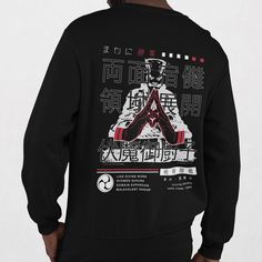 The Jujutsu Kaisen inspired graphic sweatshirt features a Sukuna design, making it a perfect choice for anime lovers. This Japanese streetwear oversized unisex sweater combines distinctive style with comfort. 𝗗𝗘𝗧𝗔𝗜𝗟𝗦  - Made with a 50% cotton, 50% polyester blend (8.0 oz/yd²) - Comfortable with durable double-needle stitching. - Itch-free; pearlized tear-away label. - Made from 100% ethically grown US cotton - OEKO-TEX-certified dyes for low environmental impact. 𝗖𝗔𝗥𝗘 𝗜𝗡𝗦𝗧𝗥𝗨𝗖𝗧 Black Graphic Design Hip Hop Sweatshirt, Black Hip Hop Sweatshirt With Graphic Design, Hip Hop Black Sweatshirt With Graphic Design, Black Sporty Sweatshirt With Back Print, Sporty Black Sweatshirt With Back Print, Oversized Anime Print Sweatshirt, Oversized Anime Print Casual Sweatshirt, Graphic Print Sweats For Streetwear, Casual Oversized Anime Print Sweatshirt