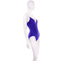 For Sale on 1stDibs - This vintage one piece purple/blue Bill Blass swimsuit is trimmed in ivory and has a low back. High cut on the sides with soft cups, this suit was designed Vintage One Piece, Purple Swimsuit, Bill Blass, Vintage Purple, Soft Cup, High Cut, Low Back, Blue And Purple, One Piece