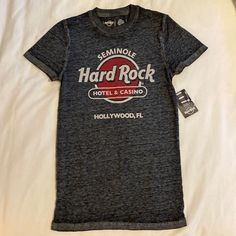 Hard Rock Cafe Hollywood, Fl Tee New With Tags Size Xs Rock Style Logo Print Tops For Concert, Rock Style Logo Print Crew Neck Top, Rock Style Crew Neck Top With Logo Print, Black Rock And Roll Tops For Streetwear, Fitted Rock Style T-shirt With Crew Neck, Black Crew Neck Rock Tops, Fitted Cotton Rock T-shirt, Fitted Crew Neck Rocker Tops, Fitted Rocker Crew Neck Tops