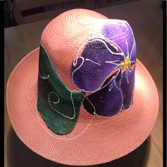 This New Peach Beauty I Purchased At An Art Fair By Artist Sm. Hand Painted Purple Flowers Green Leaves. Grosgrain Interior Band. 23” Circumstance. This Is A Perfect Easter Bonnet, Or Spring/Summer Brim. Unique & Compliments Galore! ****Price Is Firm**** Purple Sun Hat With Curved Brim For Spring, Purple Fedora Hat For Spring, Purple Fedora Hat For The Beach, Purple Fedora Hat For Beach, Purple Fedora Beach Hat, Casual Purple Sun Hat For Spring, Casual Purple Sun Hat For Summer, Purple Fedora For Beach, Casual Purple Sun Hat For The Beach