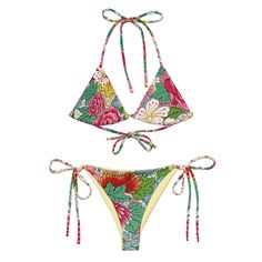 Stay comfortable and stylish all summer with this All-Over Print Recycled String Bikini set. It's made from soft recycled polyester with double-layering and UPF 50+. Style the straps how you like and get ready to swim!  * Soft and stretchy material with UPF 50+ * Sizes up to 6XL * Bikini top comes with removable padding for comfort * Multiple ways to tie and style the bikini set Disclaimers:  * Due to the 2-layered construction and internal stitching, a visible stitch may appear in the crotch se Tropical Triangle Top Swimwear For Summer, Summer Printed Swimwear With Triangle Top, Spring Tropical Swimwear With Triangle Top, Tropical Triangle Top Swimwear For Spring, Summer Printed Triangle Top Swimwear, Printed Triangle Top Swimwear For Summer, Beachwear Tropical Print Swimwear For Beach Season, Tropical Triangle Top Swimwear For Vacation, Spring Tropical Print Swimwear With Tie-side Bottom