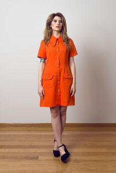 Beagle collar mini dress pockets orange a line dress scooter 1970's Orange Collar Dress, 60s Dress Outfit, Retro Orange Lined Dress, Fitted Orange Mod Dress, Mod Orange Dress With Retro Print, Diner Dress, 70’s Dresses, Beagle Collar Shirt, Orange Dress Shirt