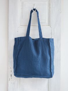 LINEN TOTE BAG The perfect solution for your Home Textile or Wedding gift - comfy, soft & cozy linen tote bag! ● Material: Premium quality 100% European stonewashed linen Linen fabrics meet OEKO-TEX 100 standards Fabric weight : +/ - 185 g/m2 (gsm) ● Color in picture: Denim Blue ● Please choose any other color on the right ● Stonewashed soft natural linen ● Dimensions: H 51 cm / 20'' W 39 cm / 15,3'' bottom 15 cm / 6'' bags strap 71 cm / 27,9'' Care: machine wash gentle 40 C/ 104 F Recommend Organic Bag, Linen Tote Bag, Sacs Design, Diy Bags Purses, Linen Fabrics, Top Handbags, Yoga Bag, Linnet, Linen Bag