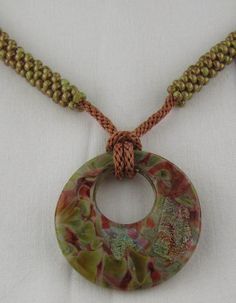 Autumn Colors Kumihimo Necklace Kumihimo Cord, Kumihimo Necklace, Donut Jewelry, Finger Weaving, Earthy Necklace, Kumihimo Jewelry, Kumihimo Patterns, Beaded Dragonfly, Mixed Media Jewelry