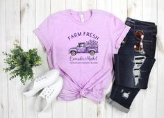 Farm Fresh Lavender T-shirt :)  This lovely shirt features a detailed lavender farms truck design. This design features a cute watercolor truck filled with lavender blooms, cursive font and other small lovely details. The blooms and truck were hand-painted with watercolors and then further re-size and digitally enhanced for printing while still maintaining the softness of watercolors.  This is a cute and a unique lavender shirt making it perfect for your spring wardrobe. The design is printed on a light weight bella canvas shirt. Available in several colors. Blessings! :)  * 100% combed and ring-spun cotton (Heather colors contain polyester) * Fabric weight: 4.2 oz/yd² (142 g/m²) * Pre-shrunk fabric * Side-seamed construction * Shoulder-to-shoulder taping Lavender Short Sleeve T-shirt For Summer, Lavender Graphic Tee With Relaxed Fit, Lavender Relaxed Fit Graphic Tee, Lavender Relaxed Fit T-shirt For Spring, Lavender Cotton Summer Shirt, Lavender Cotton Shirt For Summer, Lavender Graphic Cotton Tee, Lavender Graphic Tee In Cotton, Lavender Cotton Graphic Tee