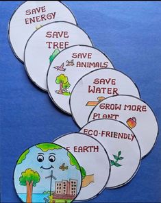 five save trees stickers on a blue surface