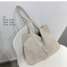 Shape: Casual TotePlace Of Origin: GUANG DONG ProvinceHandbags Type: Shoulder BagsTypes of bags: Shoulder HandbagsOrigin: CN(Origin)Main Material: CorduroyClosure Type: HaspHardness: SOFTExterior: NONEStyle: FashionModel Number: YJdjb-006LLining Material: Faux FurOccasion: VersatileGender: WOMENPattern Type: SolidNumber of Handles/Straps: TwoInterior: Cell Phone PocketInterior: Interior Zipper PocketDecoration: RuchedItem Type: Handbags Corduroy Bag, Winter Tote, Girls Handbags, Leather Laptop Bag, Handbags Casual, Casual Tote, Shopper Tote, Shoulder Messenger Bag, Canvas Shoulder Bag