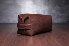 "This brown leather cosmetic bag can be comfortable and stylish accessory for your travel. Comfortable size allows you to accommodate all important travel essentials hygiene products, washing tools, combs, cosmetics, it is 30x11x10 cm or 11,8\"x4,3\"x 3,9\" size. It has 13x10 cm or 5,1\"x3,9\" size inner pocket for smaller kits; It has lining inside, 100% handmade. Side handles are made for your convenience. Note!  There can be a slight color variations, that may occur due to your monitor settin Beautiful Backpacks, Leather Cosmetic Bag, Makeup Brush Holder, Travel Cases, Makeup Brush Holders, Leather Wear, Be Natural, Bag Makeup, Makeup Organizer