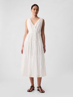 Soft pleated maxi dress.  V-neck, V-back.  Sleeveless.  Tie belt at waist.  Tiered skirt.  * Fit: Slim.  A fit & flare silhouette that sits close to the body & flares at the waist.  Hits at the ankle.  Models wearing Gap