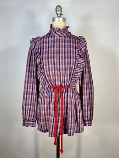 Vintage 1980's lightweight cotton blend plaid print ruffle shirt by GREAT TIMES Plaid Long Sleeve Blouse With Ruffles, Fall Plaid Top With Ruffles, Fall Plaid Ruffled Tops, Casual Plaid Blouse With Ruffles, Retro Cotton Tops With Ruffles, Plaid Cotton Tops For Daywear, Plaid Cotton Blouse For Fall, Fall Plaid Cotton Blouse, Vintage Plaid Spring Tops