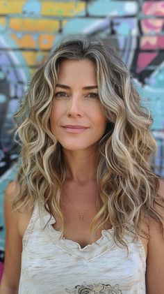 Elevate your elegance with 19 elegant medium-length layered hairstyles that add refinement and grace to your appearance. Layered Haircuts Curly Hair, Layers For Curly Hair, Medium Layered Hairstyles, Balayage Layers, Blonde Light Brown Hair, Medium Length Layered Haircuts, Grey Hair Journey, Brunette Hair With Highlights, Medium Layered Hair