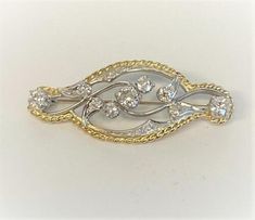 (eBay) Find many great new & used options and get the best deals for Platinum /14K Yellow Gold and Diamond Brooch at the best online prices at eBay! Free shipping for many products! Gold Brooches With Diamond Accents For Formal Occasions, Formal Yellow Gold Brooches With Diamond Accents, Formal Yellow Gold Brooch With Diamond Accents, Formal Yellow Gold Diamond Brooches, Formal Yellow Gold Diamond Brooch, Yellow Gold Diamond Brooches For Formal Occasions, Classic Yellow Gold Diamond Brooches, Classic Yellow Gold Diamond Brooch, Classic Diamond Yellow Gold Brooches