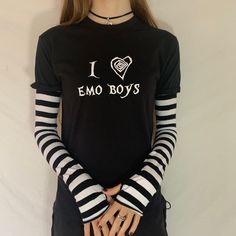 This item is hand printed on a 100% cotton t-shirt with an Acidcore label.  A Tim burton design style Black & white stripe sleeves sewn into the top with thumb holes & fingerless gives this top grunge goth vibes. The sleeves are available in the following colours: red & black, purple & black, white & black.  About Me:  Acidcore is my store based in London. All my items are hand printed with hand made transfers and some are hand embellished. My designs are inspired by different genres, gothic, fairycore, cottagecore, punk, indie. Spring Cotton T-shirt With Striped Sleeves, Trendy Striped T-shirt With Letter Print, White Crew Neck T-shirt With Striped Sleeves, Emo Style Cotton Tops With Letter Print, Emo White Tops With Letter Print, Emo Long Sleeve Cotton T-shirt, White Emo Tops With Letter Print, Emo Style Long Sleeve Cotton T-shirt, White Emo Style Top With Letter Print