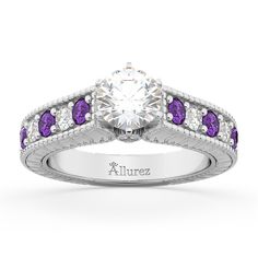 a purple and white diamond ring with the name allure on it's side