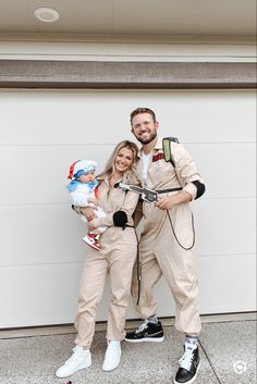 a man and woman dressed up in costumes