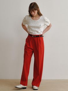 This product is a pair of Mato Pants, characterized by their wide-leg design and fluid drape, offering a combination of comfort and elegance. They are tailored to sit high on the waist, creating a sleek, elongated silhouette. The pleats at the front provide structure and a touch of classic tailoring, making them a versatile addition to both professional and casual wardrobes. - The wide-leg style allows for freedom of movement and an airy, relaxed feel, ideal for all-day wear.- A high-waisted cut with a secure closure ensures a flattering fit for a variety of body shapes.- Front pleats add a polished detail, enhancing the pants' overall sophistication.- Crafted with a lightweight fabric, these pants transition seamlessly between seasons and occasions. Red Wide Leg Pants For Formal Occasions, Viscose Wide-leg Pants For Formal Occasions, Formal Viscose Wide-leg Pants, Wide Leg Viscose Workwear Pants, Viscose Wide Leg Pants For Work, Wide Leg Viscose Pants For Work, Formal Viscose Wide Leg Pants, Chic Red Wide Leg Dress Pants, Viscose Wide Leg Ankle-length Work Pants