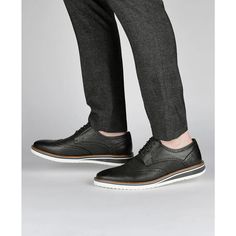 A dress shoe that combines high-style with all-day comfort, the Warrick by Vance Co. A wingtip accent and a contrasting textured design enhanced with brogue details tops this lace-up derby..Shoe width- medium.Upper material- faux leather.Toe style- round.Heel height, type- flat sole.Closure type- lace-up.Footbed- 4mm memory foam.Lining- fabric.Outsole- ethylene vinyl acetate.This item purchased online must be returned to the vendor by mail only. This item cannot be returned to Macy's stores..Faux Leather, Polyurethane.Spot Clean.Imported Derby Shoe, Textured Design, Dress Shoe, Shoes Dress, Derby Shoes, Lining Fabric, Personal Shopping, Online Purchase, Shoe Collection