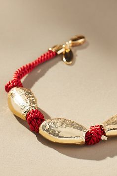 14k gold-plated brass, cord Lobster clasp Imported | Western Beaded Cord Bracelet by Anthropologie in Red, Women's, Gold/Plated Brass Gold Hand-strung Braided Bracelets, Adjustable Gold Single Strand Beaded Bracelet, Red Fits, Cord Bracelet, Cord Bracelets, New Bag, Wedding Accessories, Lobster Clasp, Color Coding