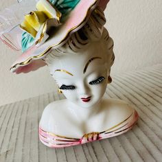 Vintage 50's Porcelain Lady Head Vase with Pink Hat MINT The flowers and stuff in her hat can be removed. Lefton Pink and Gold Dress & Hat Yellow Rose Eyelashes Bumper Bangs Retro Mini Hats For Vintage Events, Vintage Mini Hats For Kentucky Derby, Vintage Kentucky Derby Costume Hats And Headpieces, Vintage Costume Hats And Headpieces For Garden Party, Vintage Pink Mini Hat With Curved Brim, Retro Mini Hats For Kentucky Derby And Vintage Events, Vintage Costume Hats For Garden Party, Vintage Pink Mini Hats For Kentucky Derby, Vintage Pink Mini Hats For Vintage Events