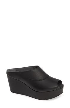 A wrapped wedge, chunky rocker platform and curvy seamed vamp underscore the '70s-inspired aesthetic of a decidedly modern peep-toe mule. 3" heel; 1 1/2" platform (size 8.5) Lightly cushioned footbed Leather or textile upper/leather lining/synthetic sole Imported Women's Shoes Wedge Mules, 70s Inspired, Platform Wedge, Platform Wedges, Mule, Rocker, Women's Shoes, Slip On Sneaker, Black Leather