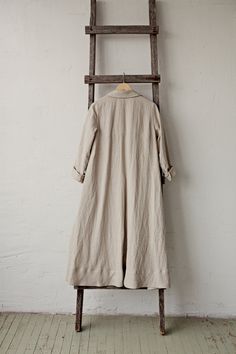 Long coat is made from 100% soft and washed medium weight linen. Details: - Composition: 100% Oeko-Tex certified linen - A shaped - Colour: natural - Linen belt - 3 linen buttons - Size: XS, S, M, L, XL, XXL - Medium weight linen - Linen care: machine wash gentle; tumble dry low, ironing optional - The price is for one coat, other pictured items are not included Relaxed Fit Long Linen Outerwear, Beige Linen Outerwear For Daywear, Oversized Beige Linen Outerwear, Oversized Linen Outerwear For Daywear, Oversized Linen Long Coat, A Line Coat, Long Coat For Women, Linen Belt, Women Long Coat